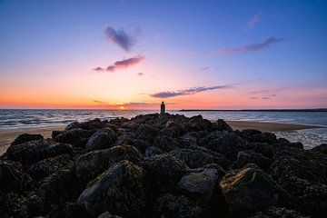 Brouwersdam met zonsondergang van Björn van den Berg