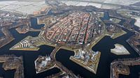 Aerial photo fortified town of Naarden in snowy landscape