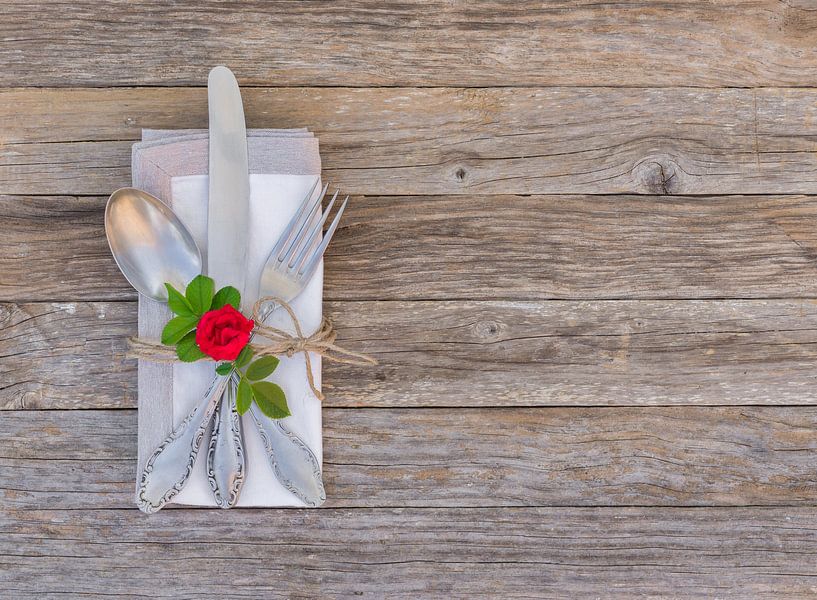 Valentines day or wedding table place setting with romantic rose flower by Alex Winter