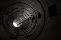 Abstract grunge tunnel with light at the end