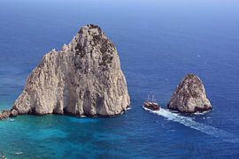 Pirate boat passes the Mizithres rocks by Bettina Schnittert