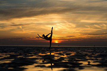 Artistic nude silhouette with sunset in the Wadden Sea by Arjan Groot