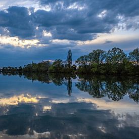 The quarry pond in the evening light by Photoart-Naegele