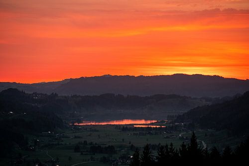 Zonsopgang met uitzicht op Alpsee Immenstadt