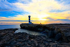 Leuchtturm im Sonnenuntergang von Dieter Fischer