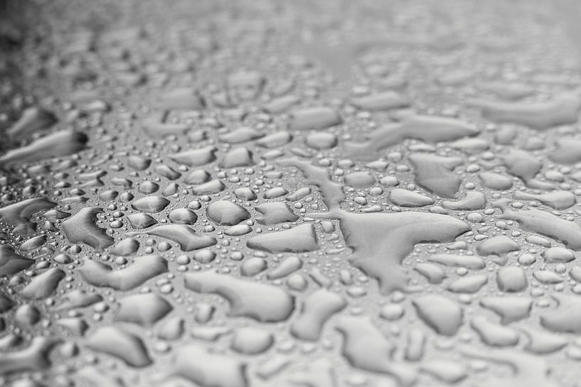 Rainwater on a metal surface by Heiko Kueverling