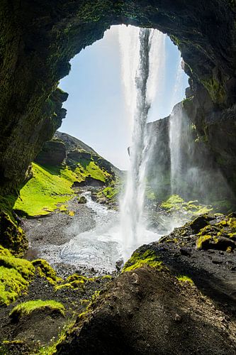 Kvernufoss - hidden waterfall among rugged rocks