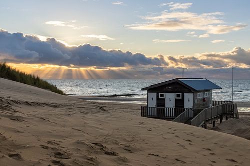 North Sea coast at its most beautiful: Sun harps, dunes, pier and sea
