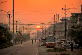 A stunning sunrise in a village near Chitwan National Park by Laimute Kuriene