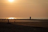 Sunset at the 'steenmannetje' in Mariakerke-Bad
