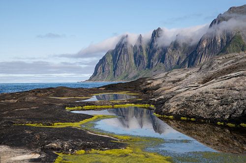 Greifen nach Berggipfeln auf Senja