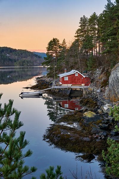 Cabin along a fjord during sunset, Norway by qtx