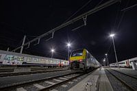 Lichtstralen boven de treinen