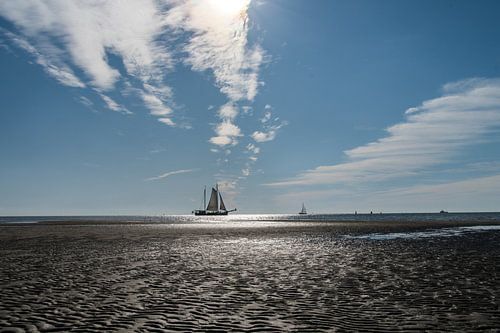sailing boat on the mudflats