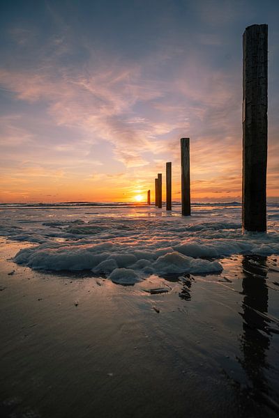 Beautiful sunset and sea foam North Sea beach by Peter Bartelings