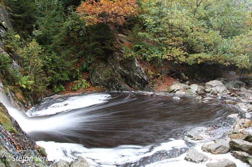 Beautiful waterfall with autumn colors