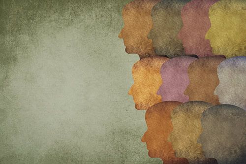 Silhouettes of heads look in one direction