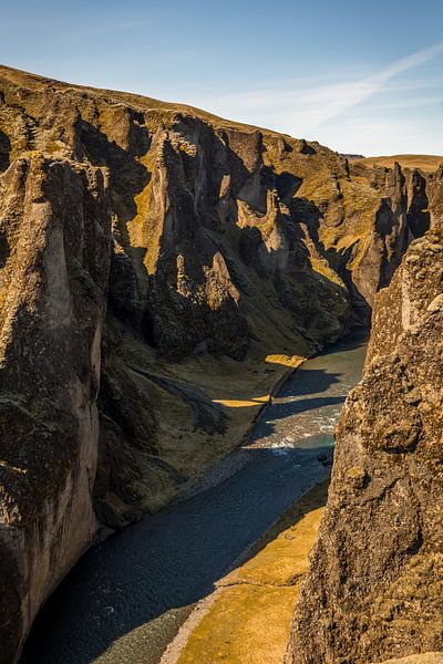 River between the rocks at sunset by Maarten Borsje