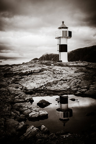 Lighthouse reflected in the water