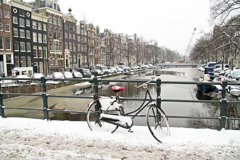 Winter on the amsterdam canals in the Netherlands by Eye on You