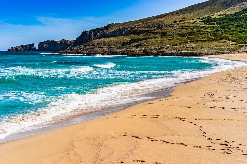 Footsteps on sandy beach, beautiful seaside on Majorca by Alex Winter