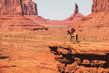 Indian on horseback in Monument Valley
