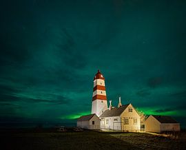 The northern lights above the lighthouse of Alnes by qtx