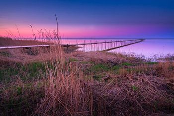 Jetée de la plage de Øster Hurup (Danemark) pendant le coucher du soleil