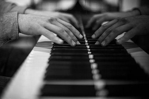 Pianospeler op Grand Piano