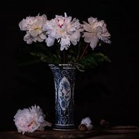 still life delft blue vase with peonies