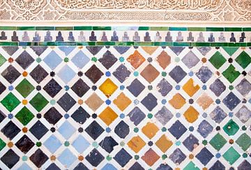 Wall with coloured Moorish tiles in Granada by Angeline Dobber