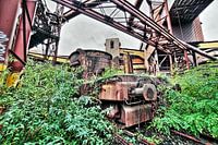 Urbex train with bucket in steel factory industry.