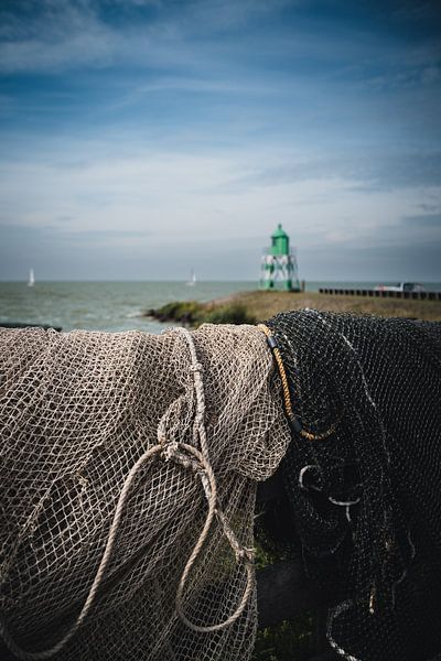 Lighthouse outer harbor east Stavoren by Vera de Vries