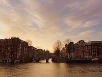Amstel under old-pink clouds