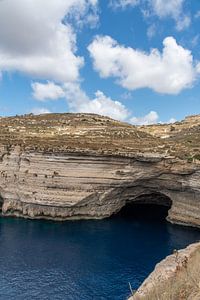 Jagged cliffs and clear blue waters in Malta by Manon Verijdt