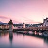 Sunset behind the Kapellbrücke of Luzern van Ilya Korzelius
