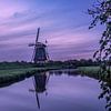 Kinderdijk windmill just after sunset by Rick van de Kraats
