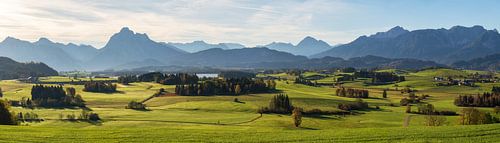 Large mountain panorama with Allgäu Alps, Ammergau Alps and Hopfensee lake