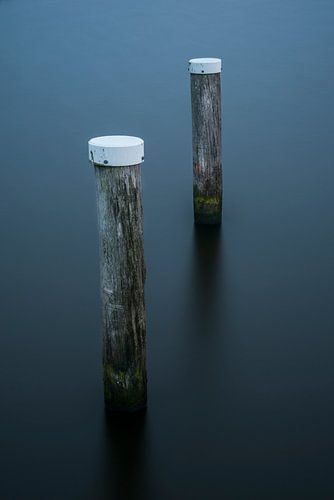Bolder poles in the water, minimalism