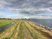 Color photo of the sea dike on the Markermeer on the south east side of the island of Marken