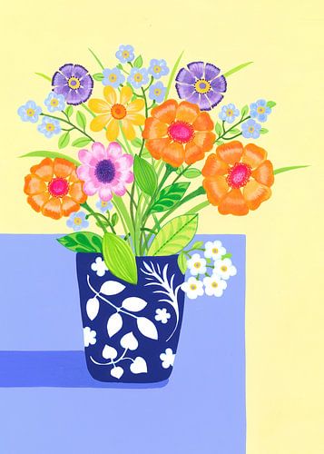 Boeket bloemen in blauw-witte vaas