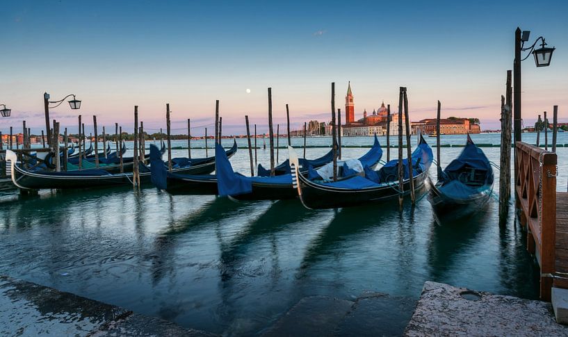 Gondolas at sunset in Venice by Alex Neumayer