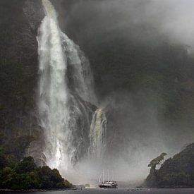 Boat in dramatic landscape of Milford Sound New Zealand by Albert Brunsting