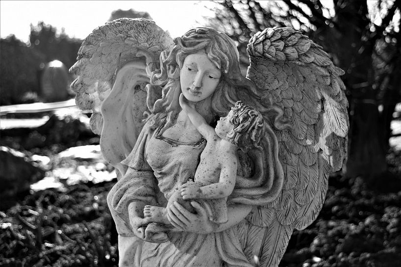 Beautiful angel with large wings and child in black and white by Maud De Vries
