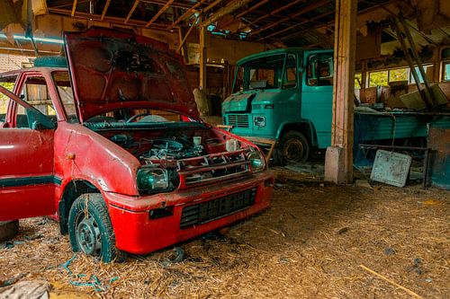 Abandoned Workshop with Neglected Vehicles
