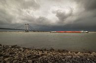 Impressive sky over the river Waal and the Prins Willem Alexander bridge at Echteld by Moetwil en van Dijk - Fotografie thumbnail