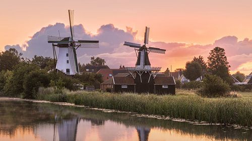 The windmills at Ten Boer at sunrise in the province of Groningen by Marga Vroom