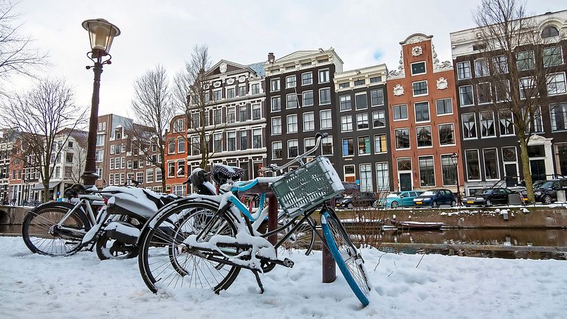 Verschneites Amsterdam auf den Grachten von Eye on You