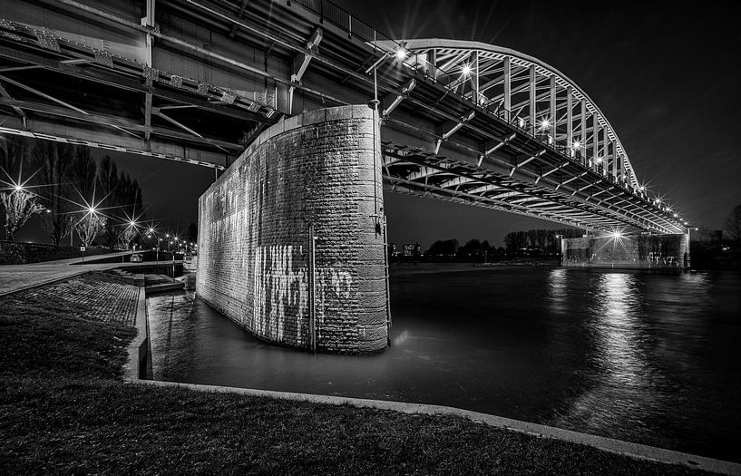 The Arnhem road bridge in black and white by Dave Zuuring
