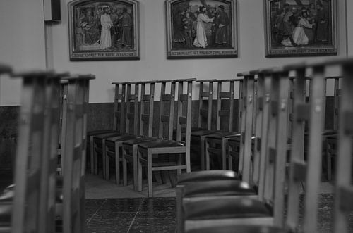 Church chairs in a church.